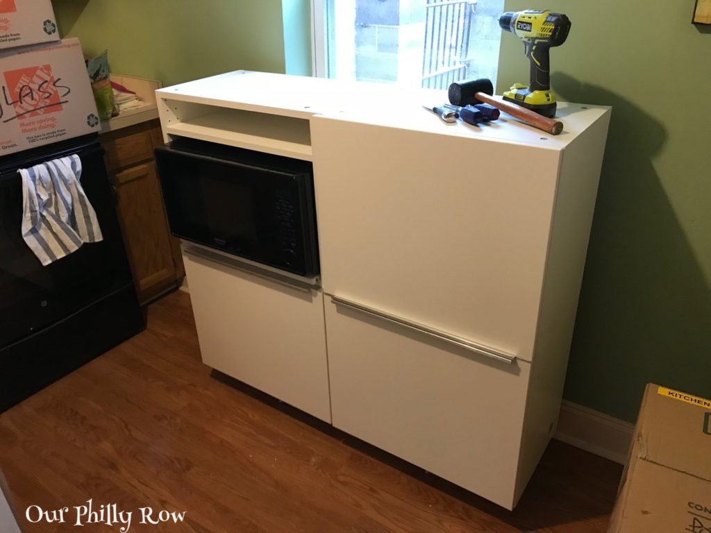 This was our fauxdenza in the entry gallery of our New York apartment. With the purchase of one more unit, it has been reconfigured and repurposed as a kitchen storage/microwave cabinet.